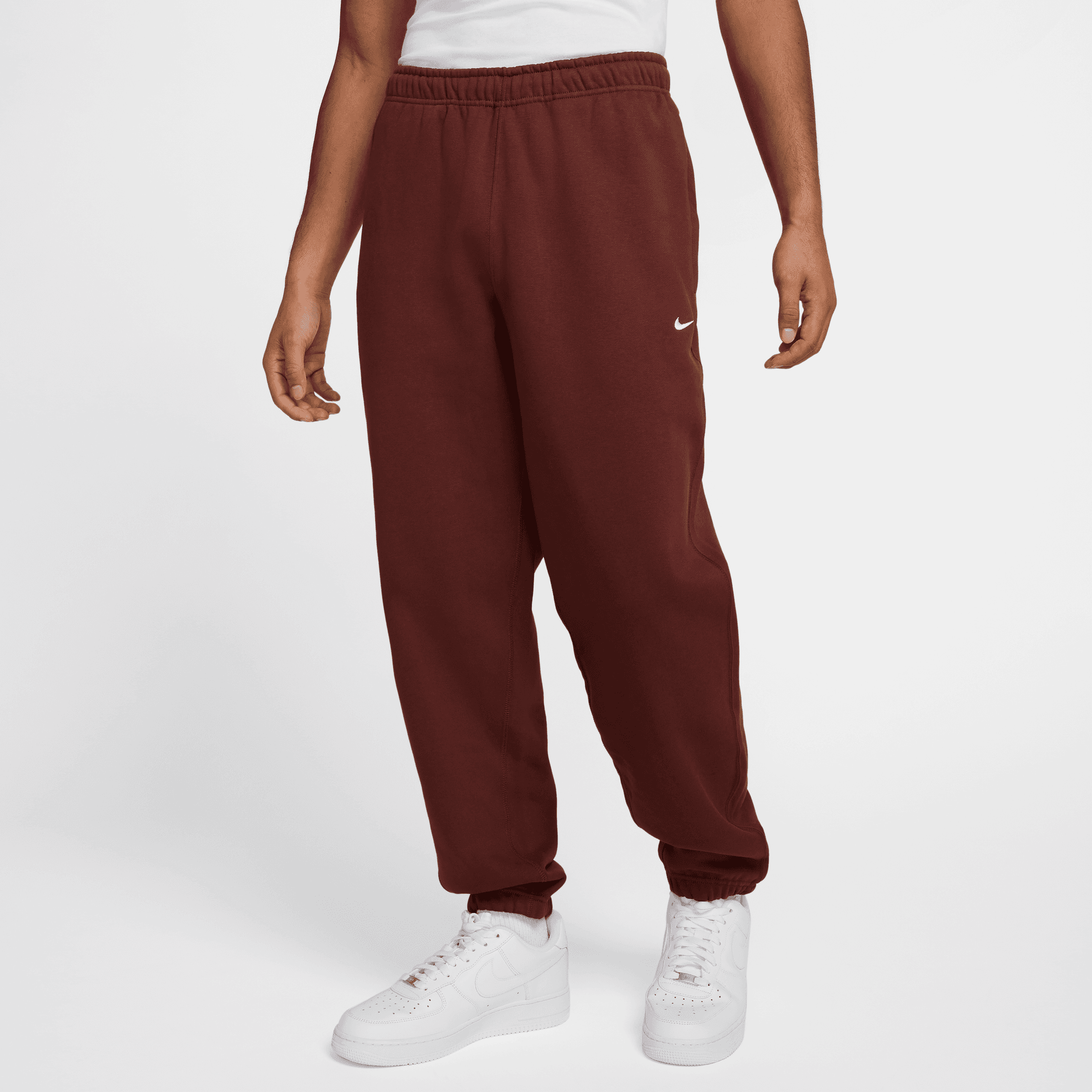 Nike Solo Swoosh Men's Brown Fleece Pants – Puffer Reds Nike Solo Swoosh Men's Brown Fleece Pants – Puffer Reds