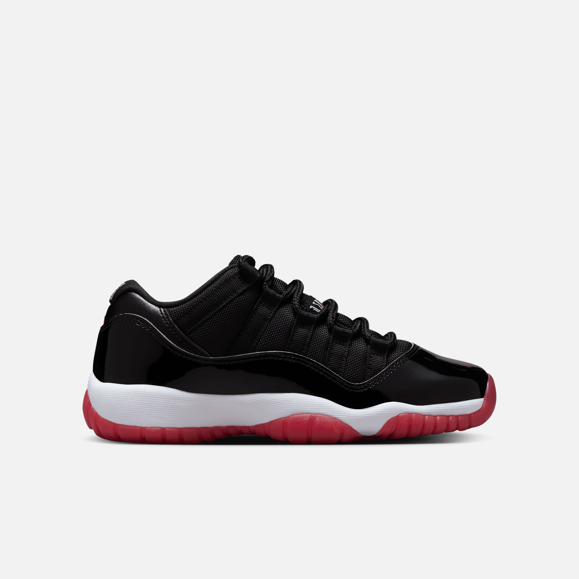 Air Jordan Big Kids' 11 Retro Low Bred (GS) – Puffer Reds