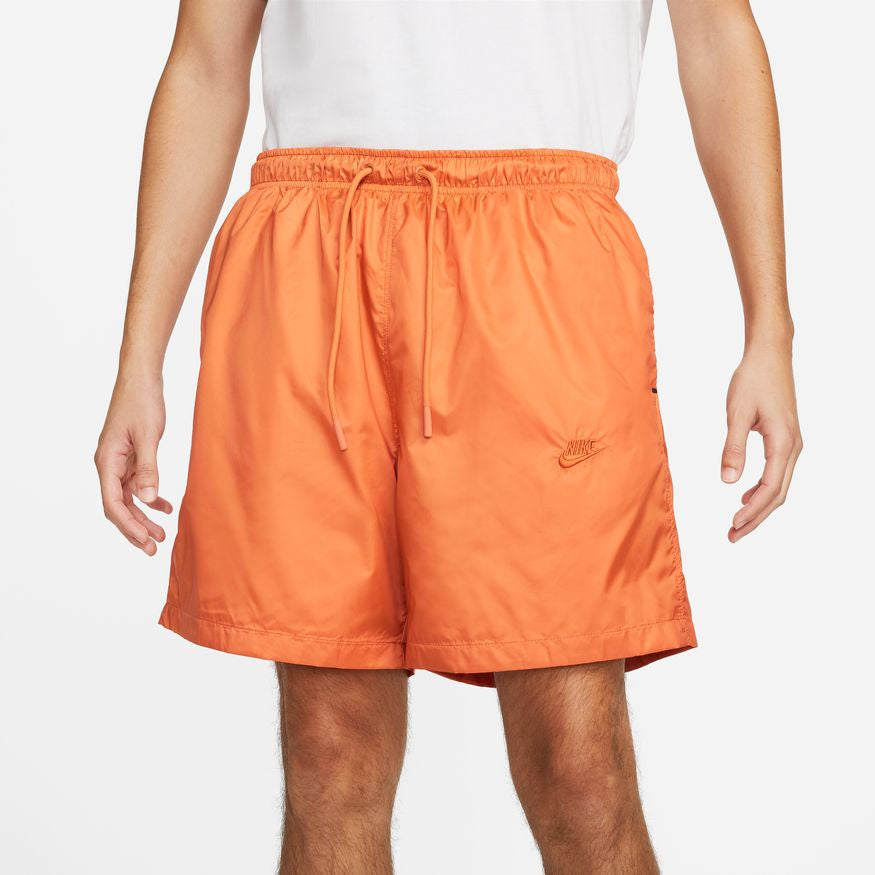 Orange nike cheap woven shorts