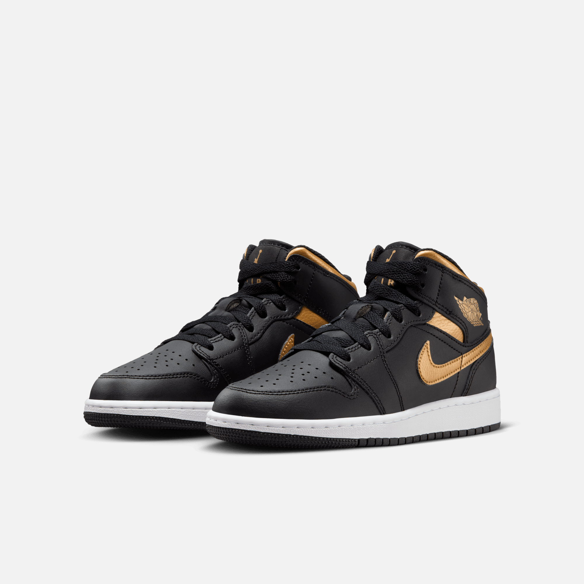 Nike air jordan retro black and gold sales