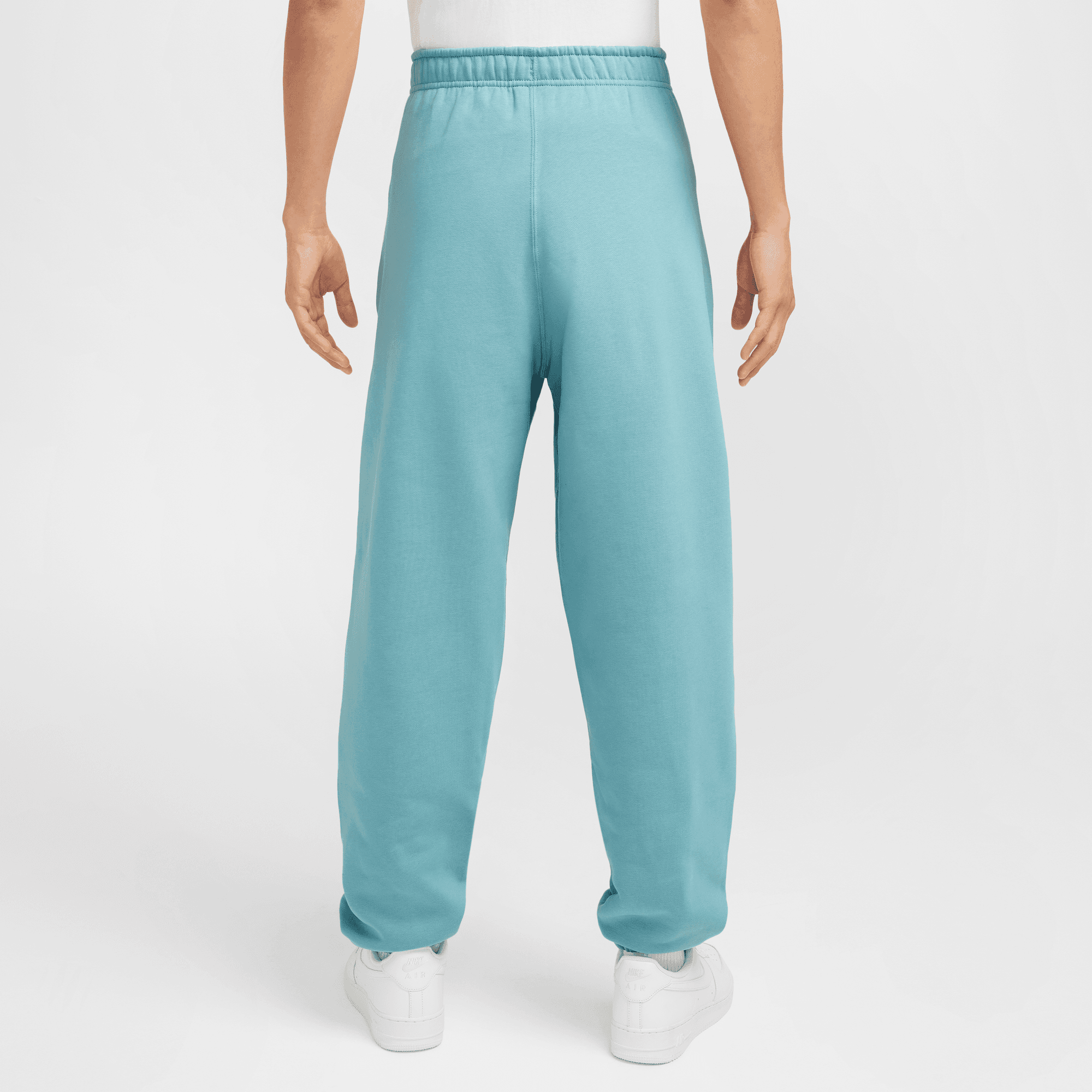 Nike Solo Swoosh Men's Turquoise Fleece Pants – Puffer Reds Nike Solo Swoosh Men's Turquoise Fleece Pants – Puffer Reds