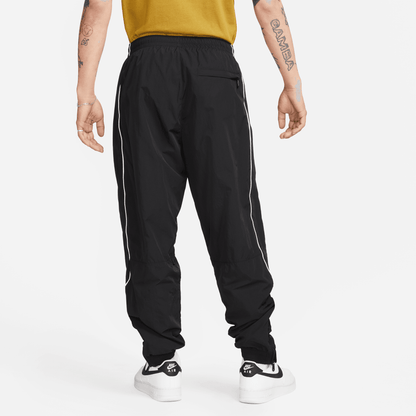 Nike sb swoosh black track pants hotsell