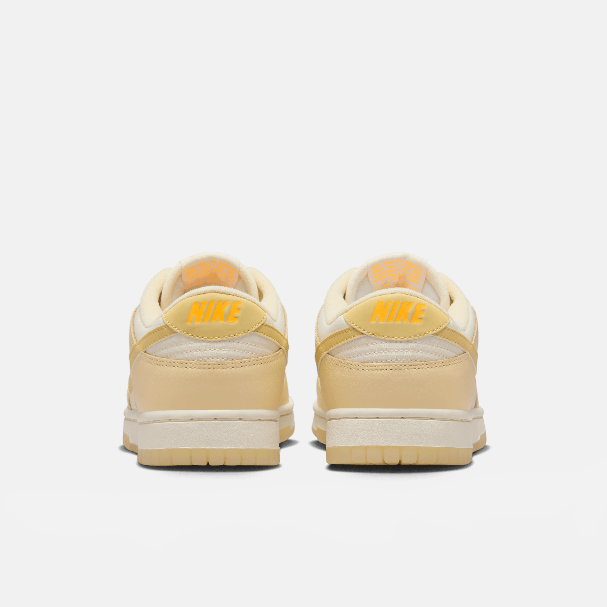 Nike Women's Dunk Low Muslin Team Gold