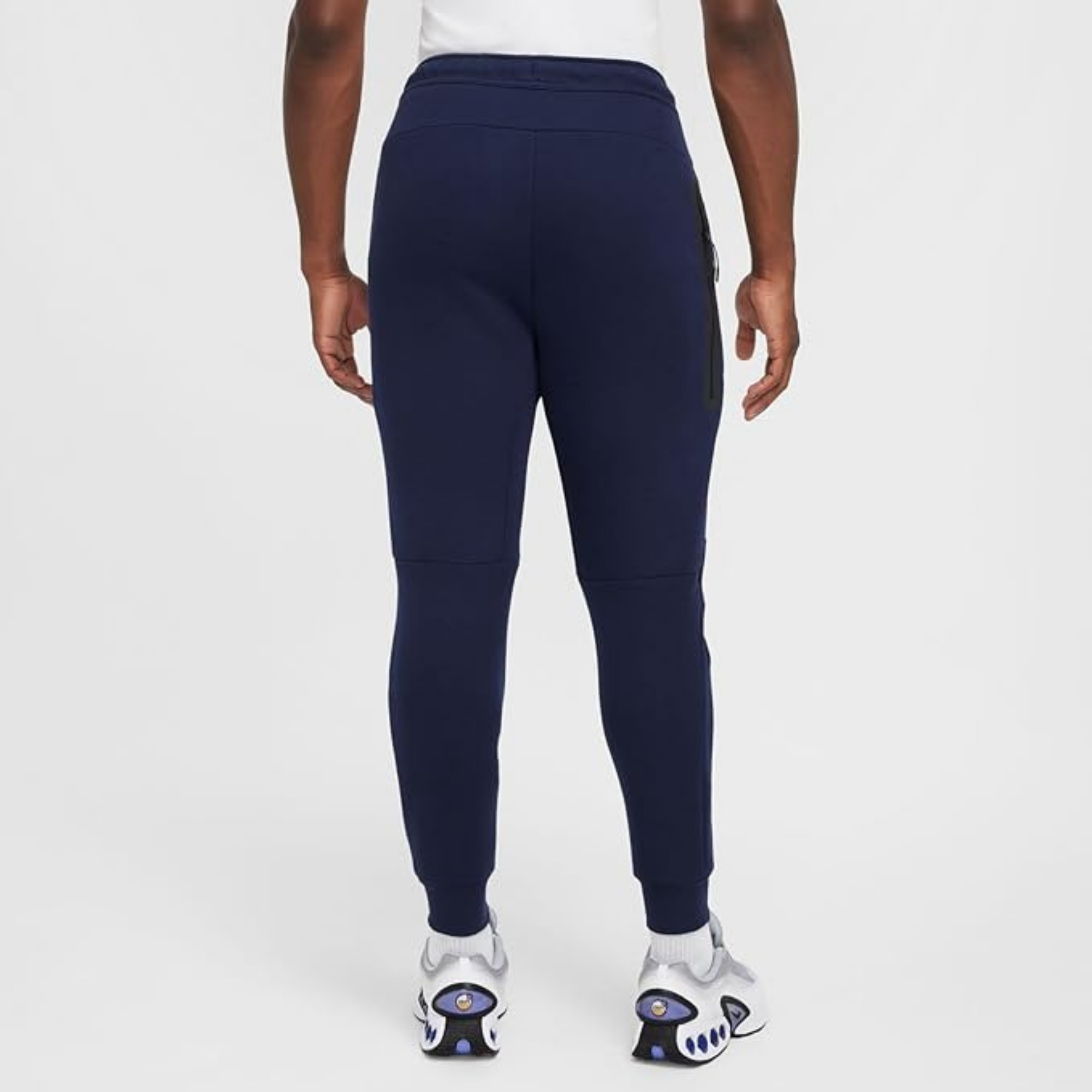 dark blue nike tech joggers